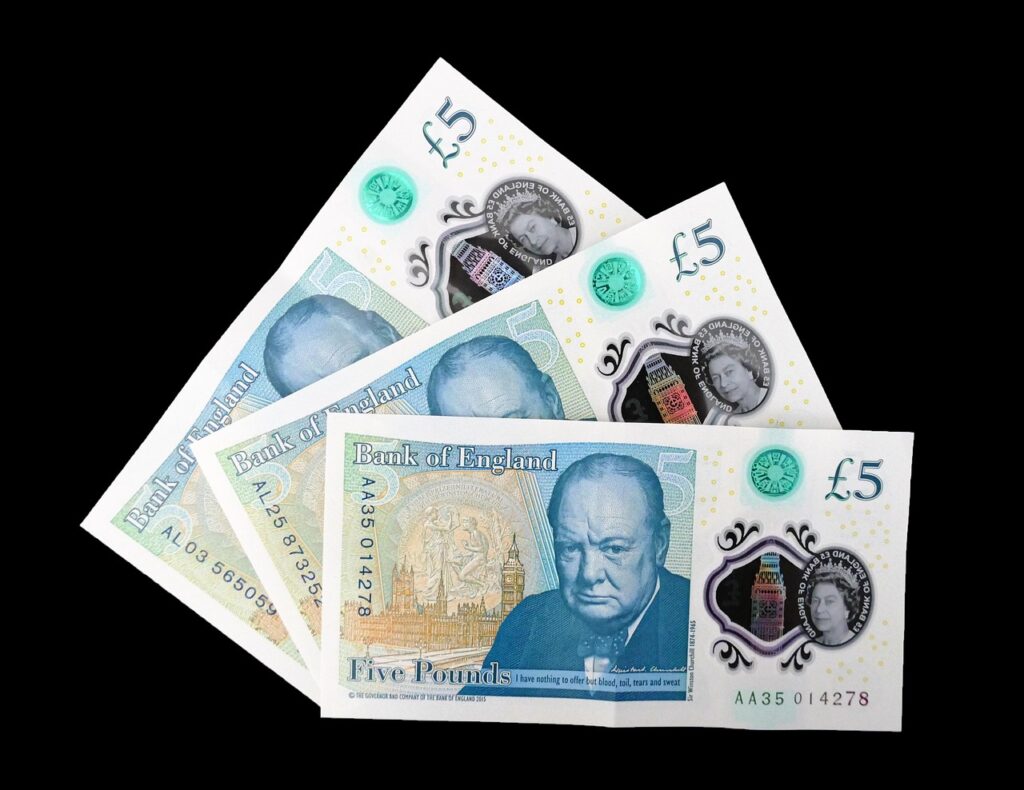 A side-by-side comparison of a UK doctor's salary in pounds and a Sri Lankan doctor's salary in rupees.