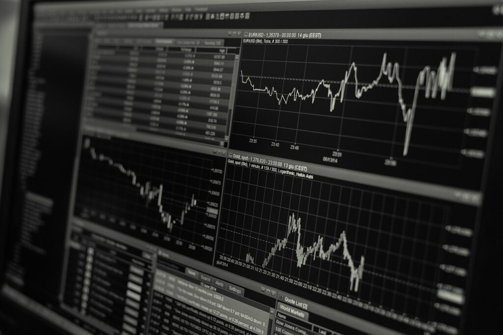 Regulators at a meeting table reviewing documents and screens during a stock market trading halt